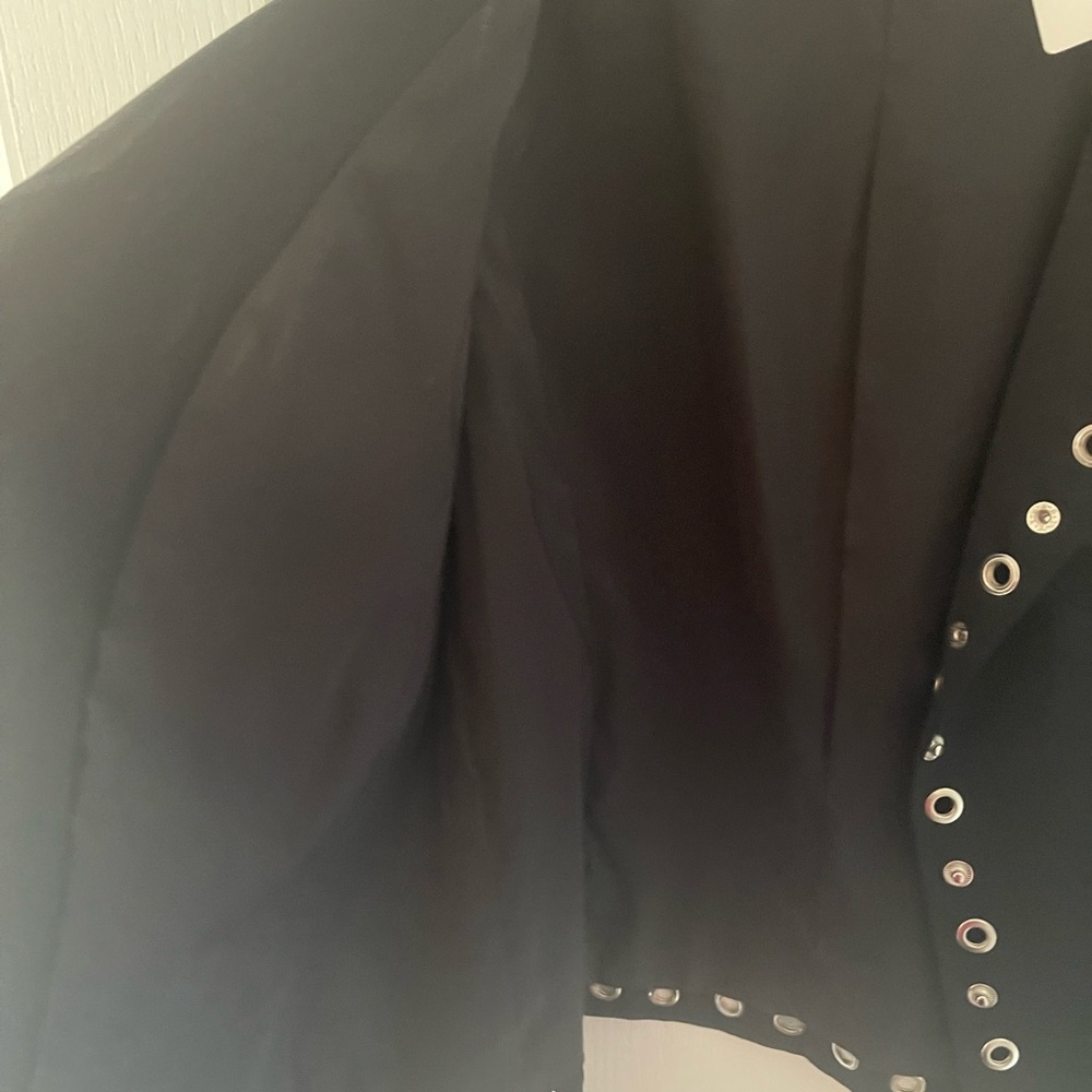 Black vest with ornaments